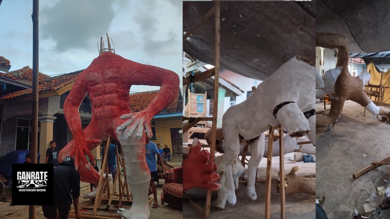 Proses pengecetan ogoh-ogoh warna merah H-18