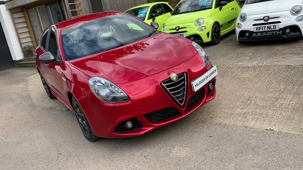 Alfa Romeo Giulietta in 8C red for sale.