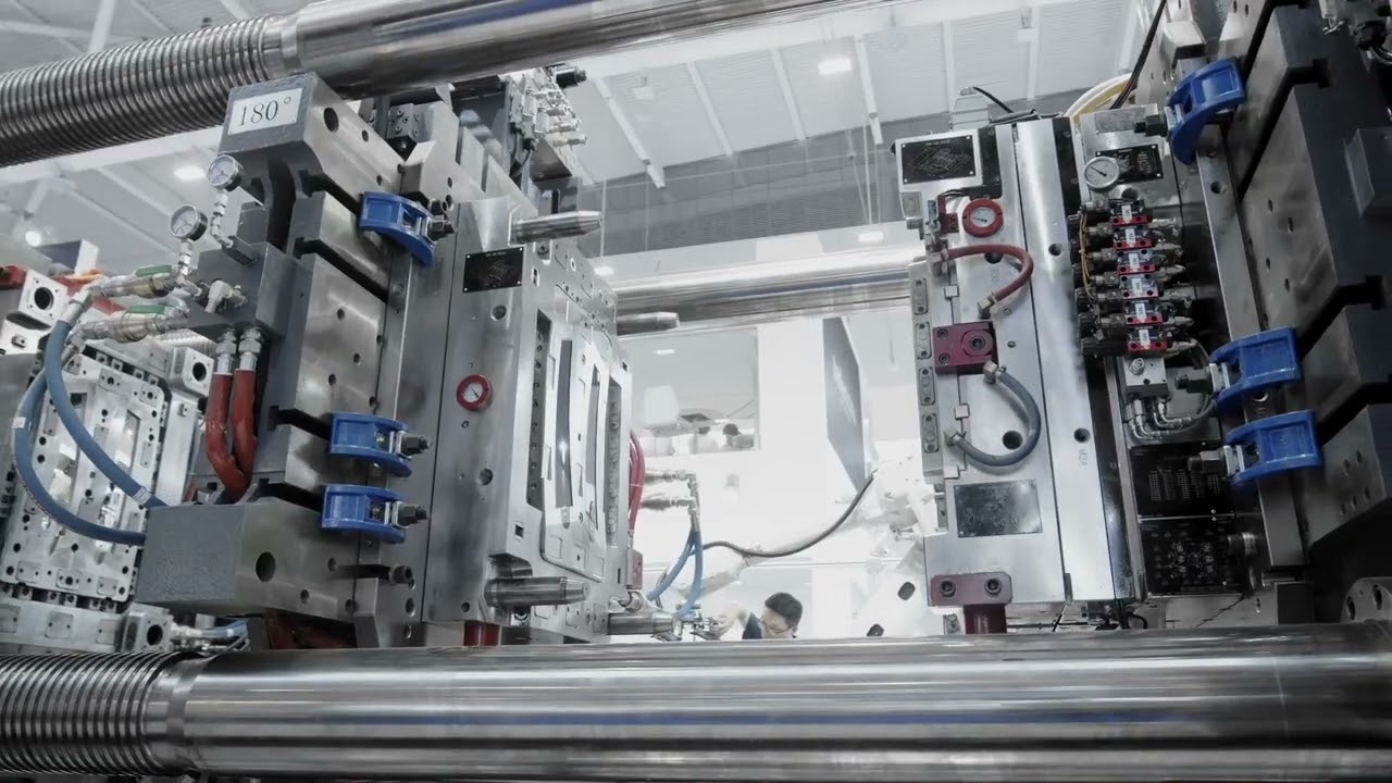 CoinSure&trade; Injection Molding Compression Application-NEO&middot;M1120s horizontal rotary turntable IMM