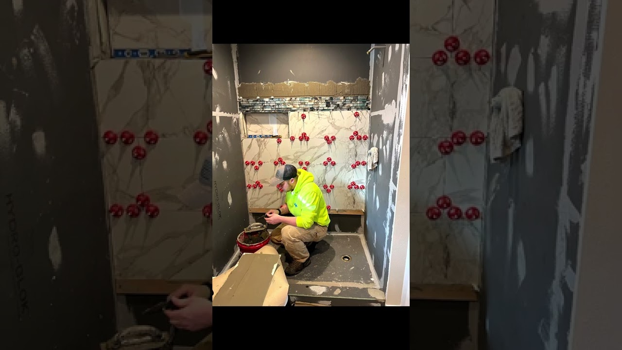 Walk in shower using Hydro Block ready made shower pan Beautiful pebble floor￼￼