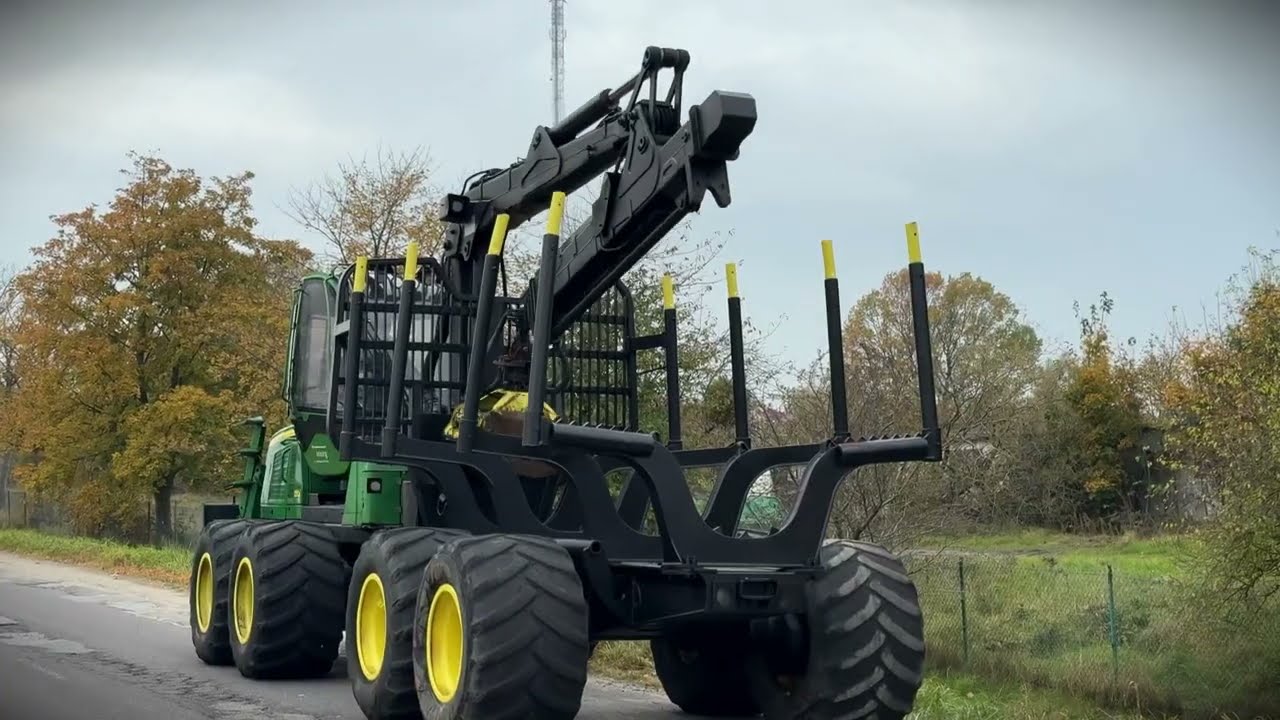 AUKCJA FORWARDER JOHN DEERE 1210E Z LEMIESZEM