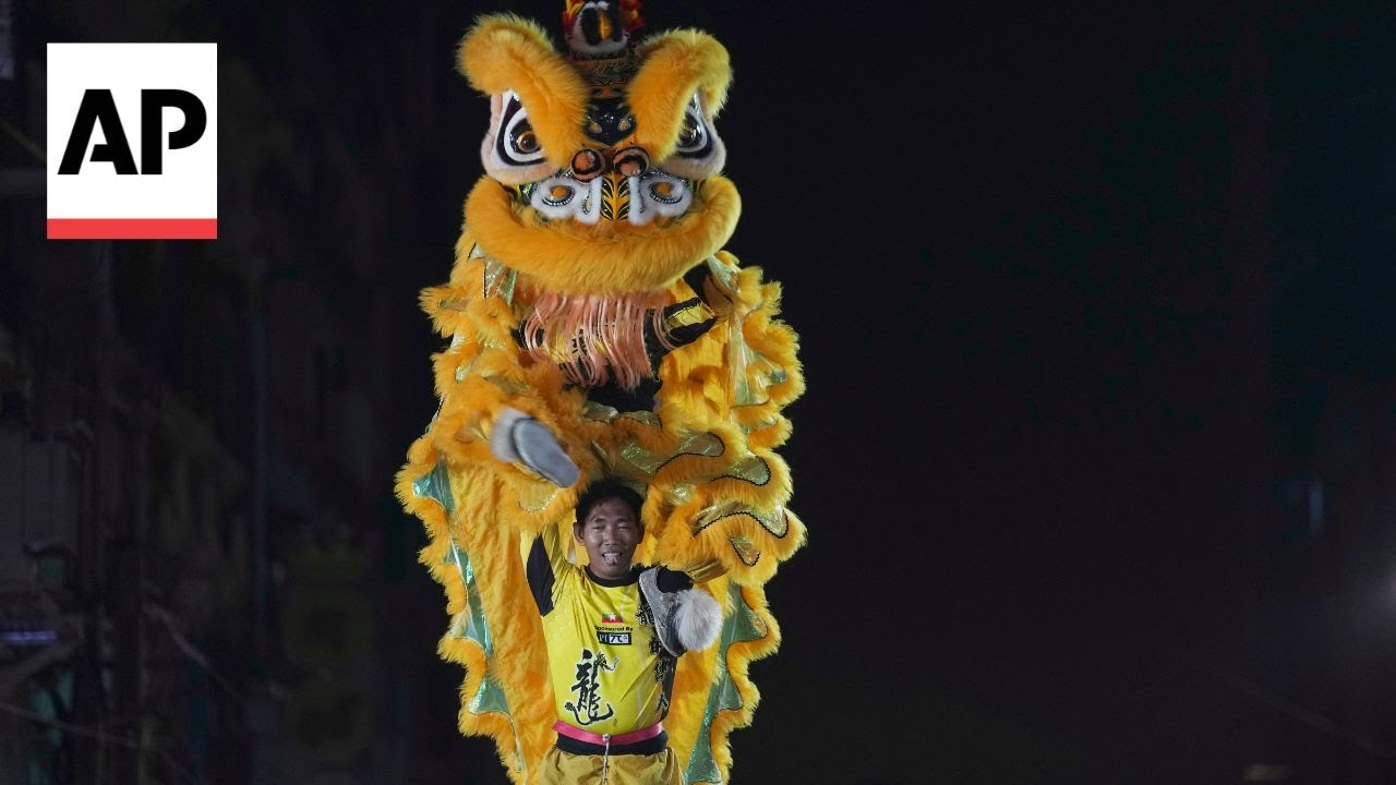 Lion dancers welcome the Lunar New Year in Myanmar