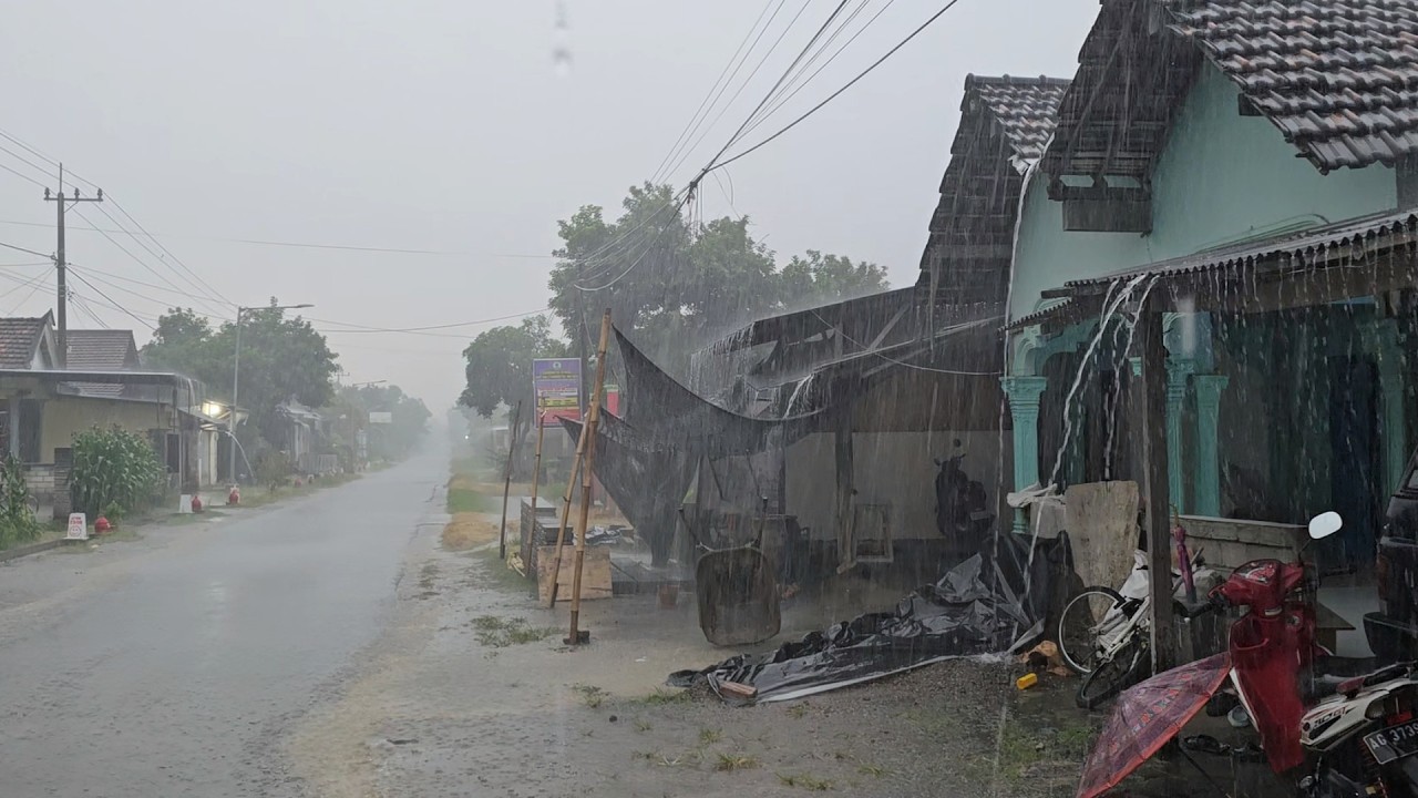 rainstorm in a quiet village, rainstorm never stops every day, walking in a heavy rainstorm