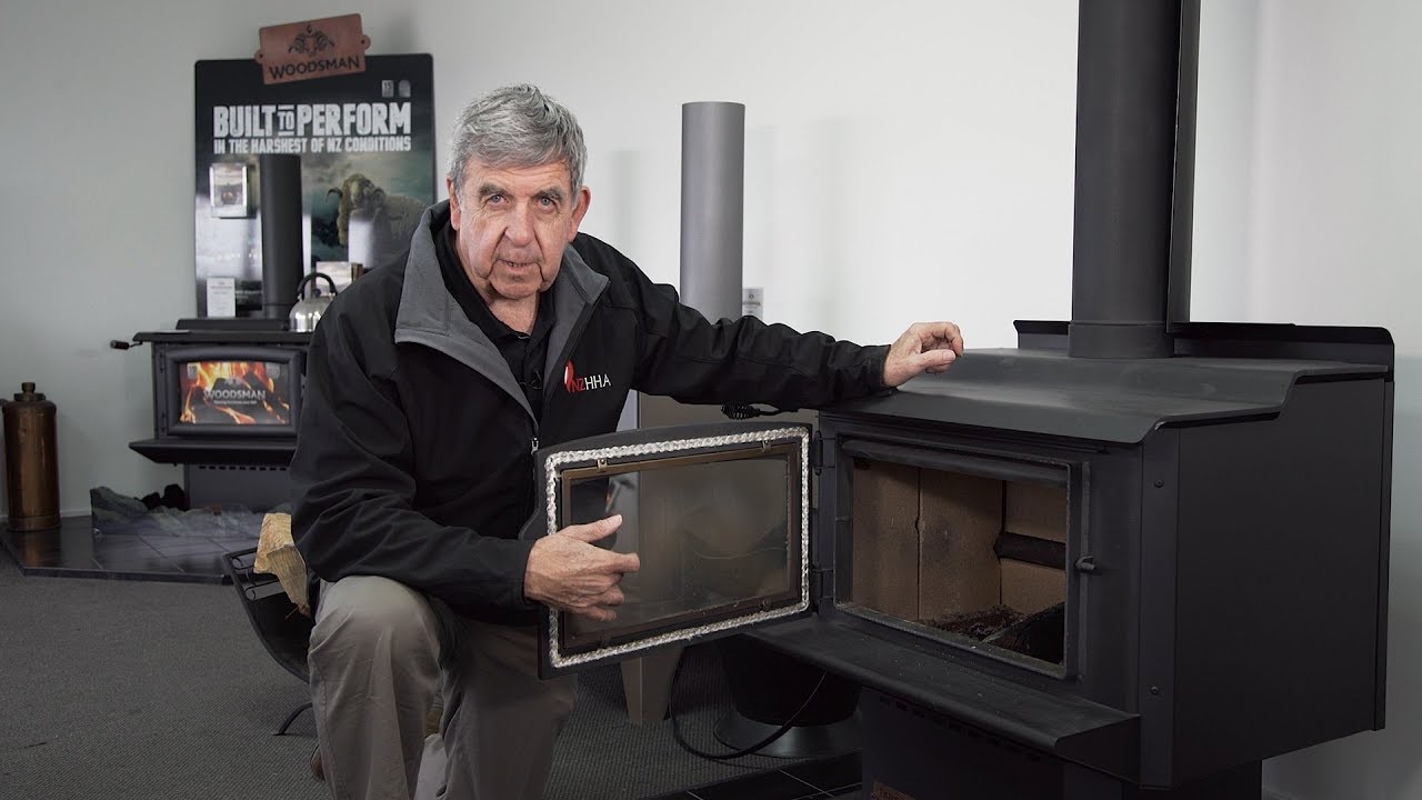 Why is my wood burner's glass door dirty?