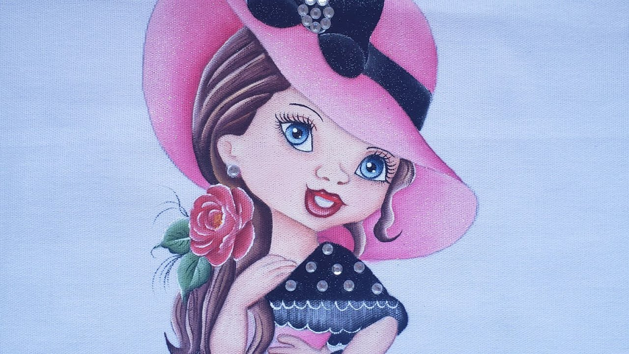 Pintando bonequinha com rosa e lenço sobre o ombro.