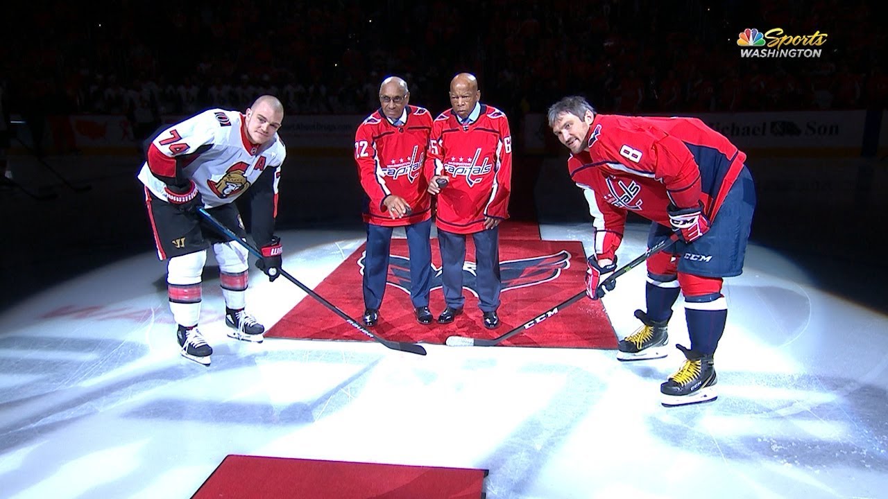 Willie O'Ree and John Lewis drop the first puck in Washington