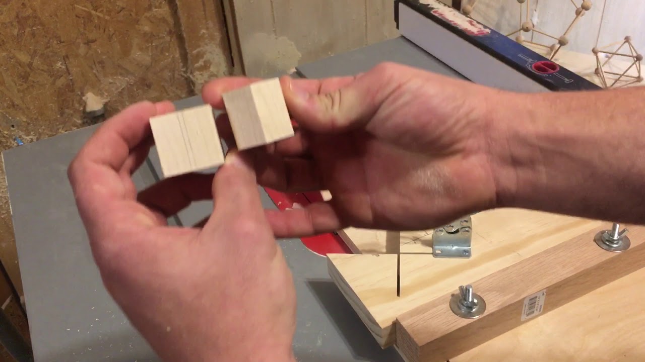 Cutting a regular dodecahedron from a wooden cube.