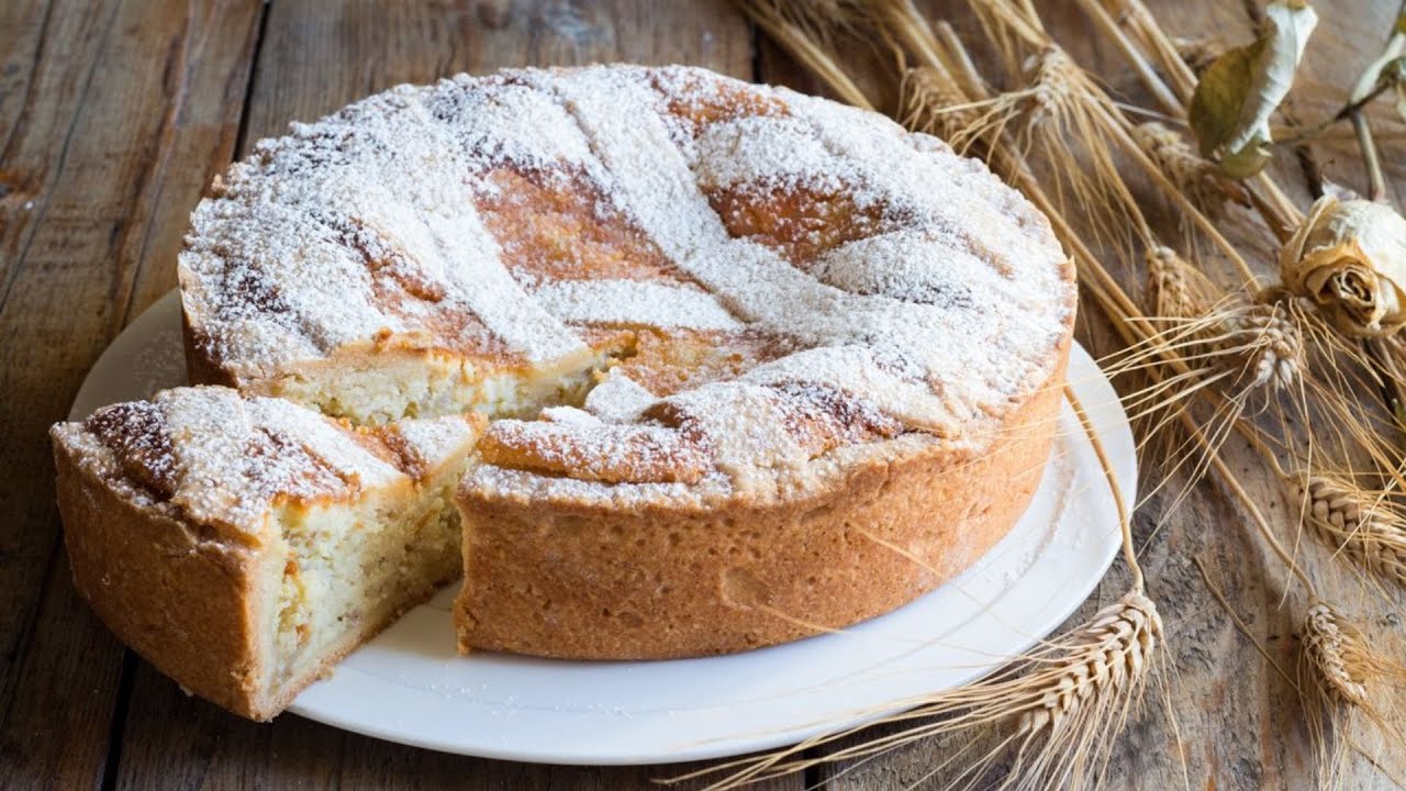 NEAPOLITAN PASTIERA, traditional Easter dessert, made with shortcrust pastry and cooked wheat.