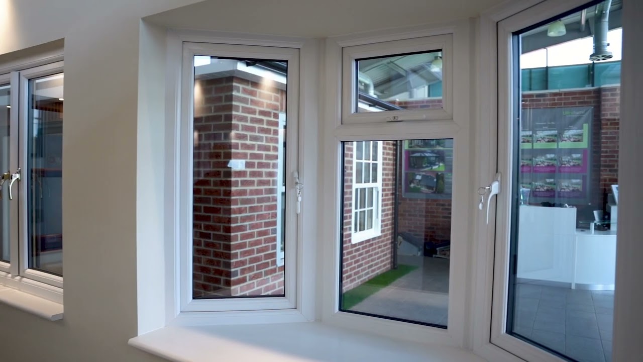 Extreme UPVC Bow Window in Rosewood