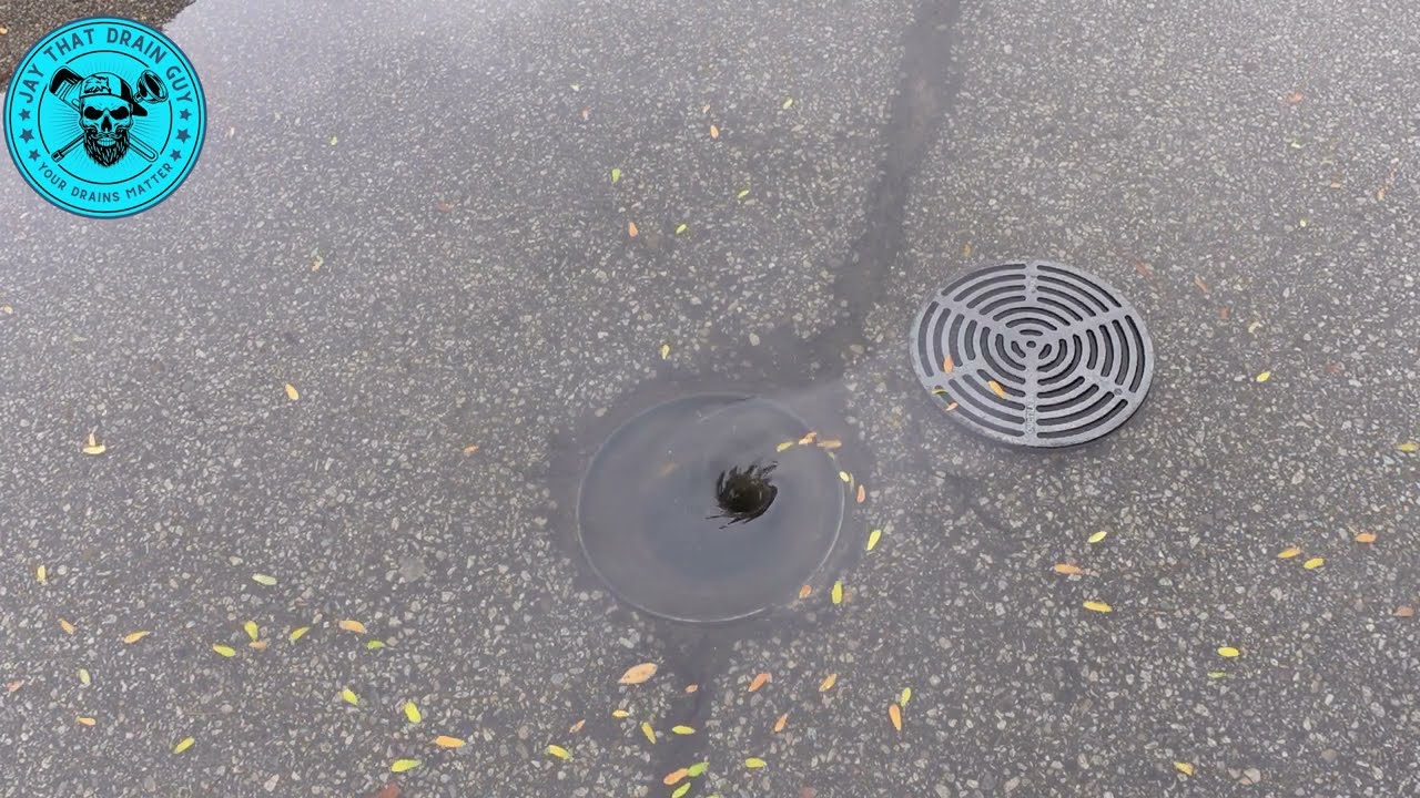 Whirlpool In A Flooded Parking Lot