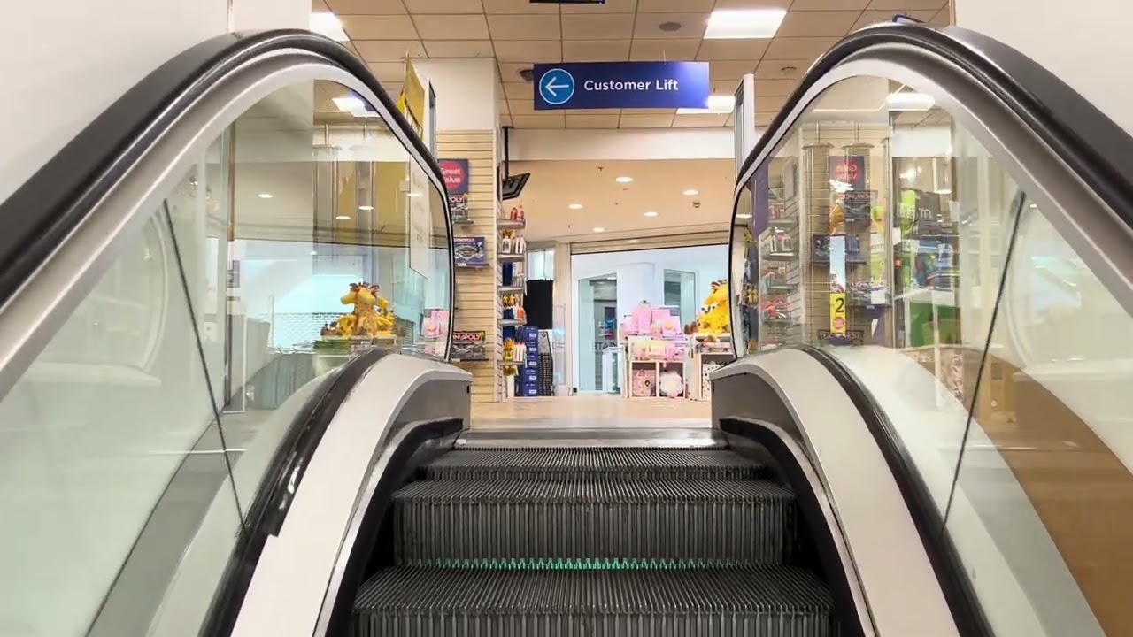 Harrogate, England. 1x Schindler Escalator ride up at WHSmith
