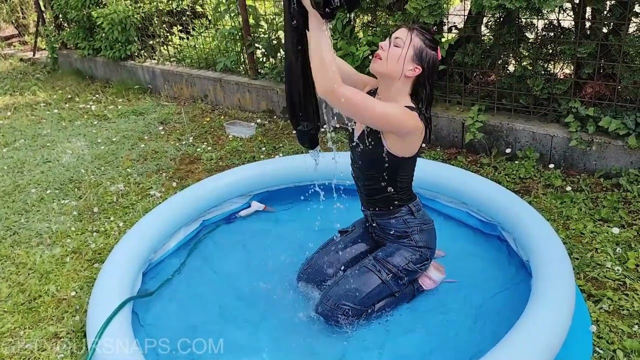 Barby gets wet in jeans and hoodie in the kiddie pool   Trim
