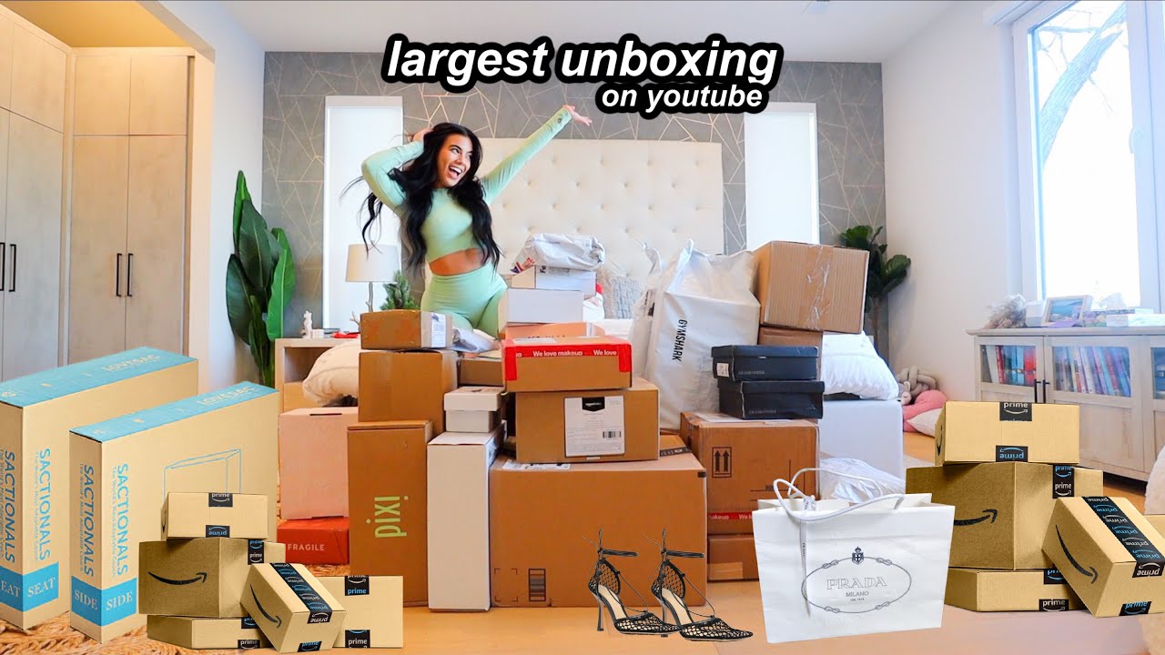one year of packages! huge holiday clothing, makeup pr unboxing haul | vlogmas day 20