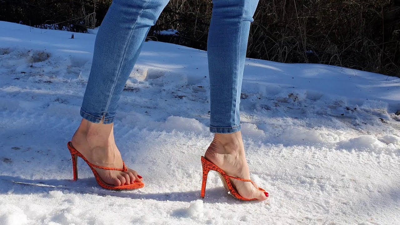 Mules high heels sandals on snow, high heels on ice, high heels snow walk (scene 421)