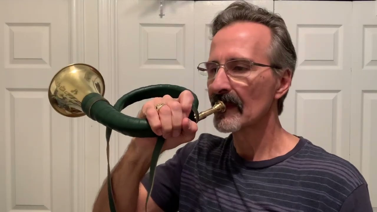 Two German Hunting Horns.   Clewing Pocket Hunting Horn in Bb.  Furst-Pless Hunting Horn in Bb.