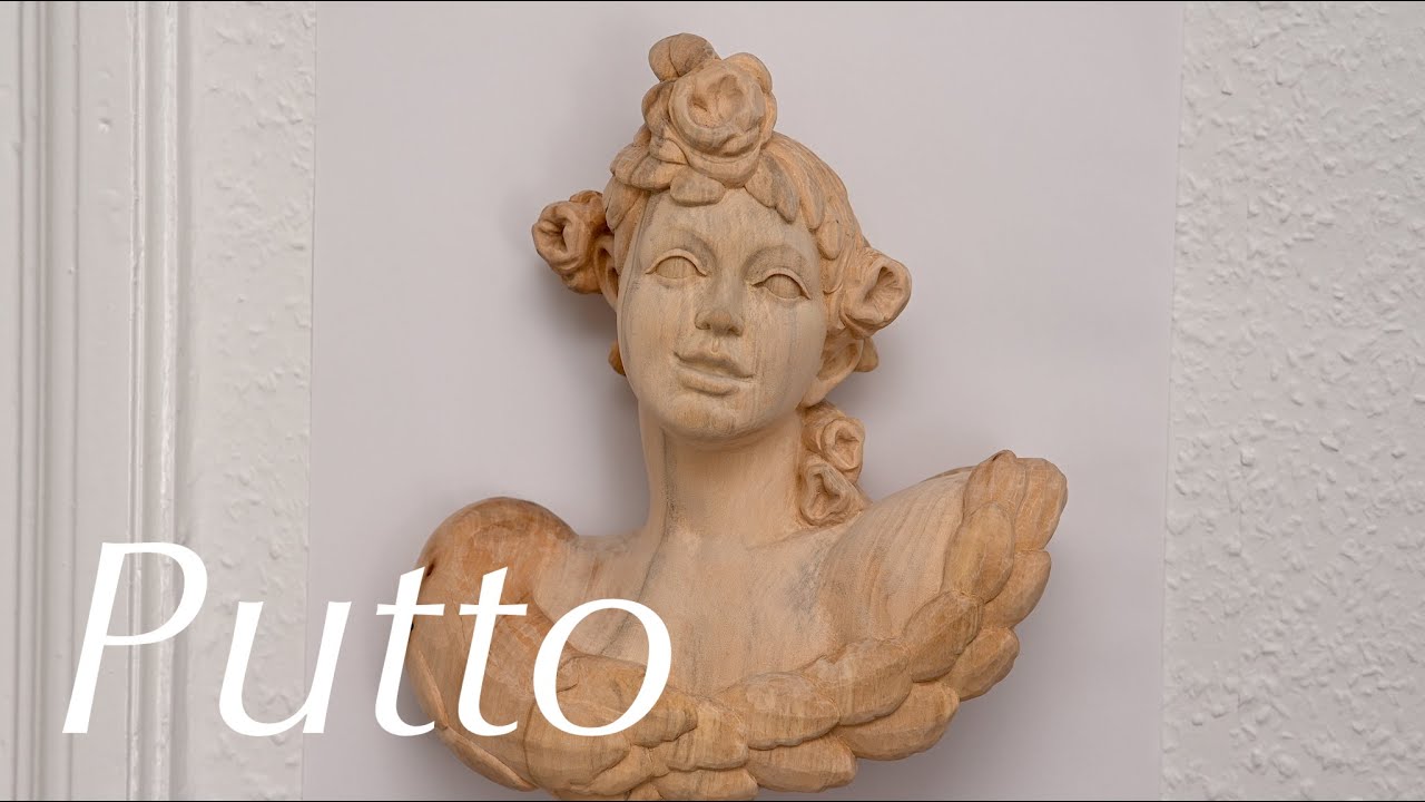 Putto aus Lindenholz / Rokoko Engelskopf (Simeon Decker)