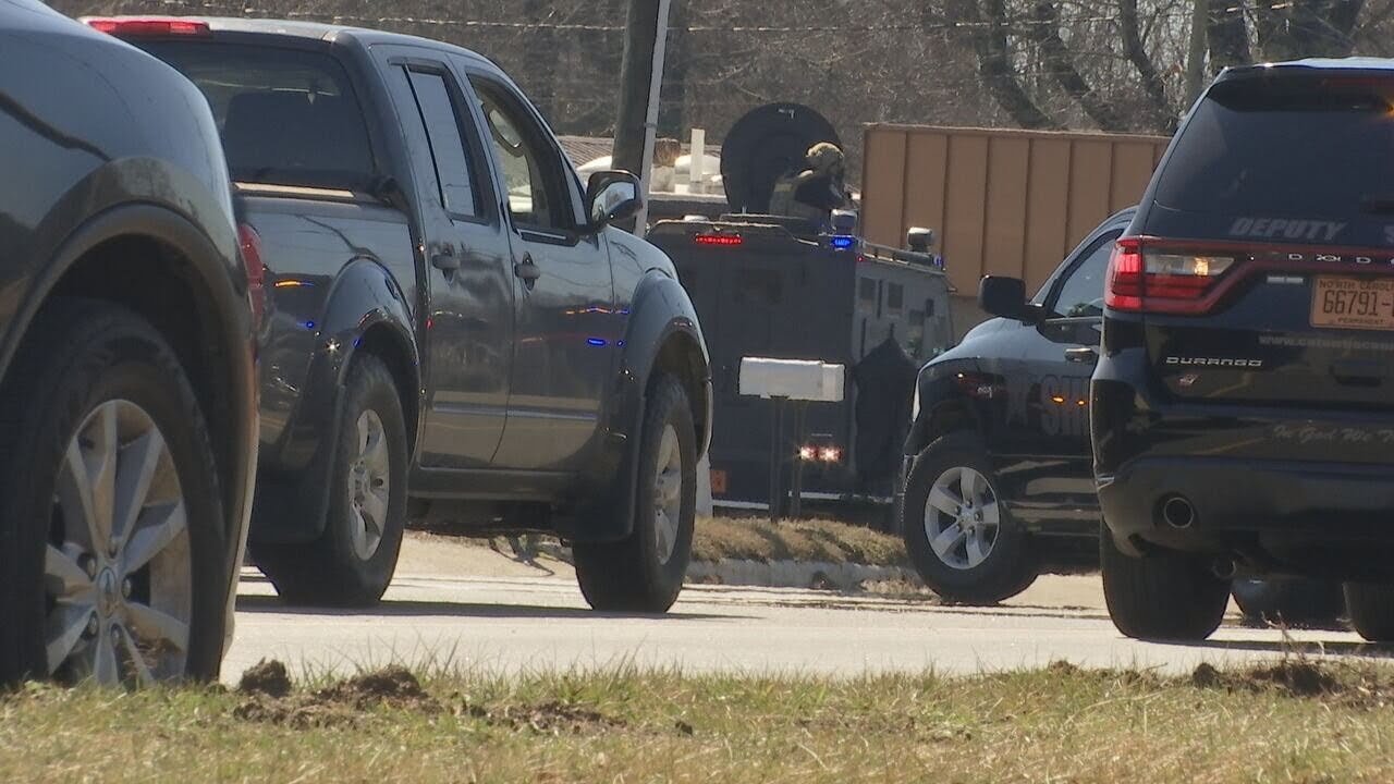 Road reopens after tear gas deployed, ends SWAT standoff | WSOC-TV