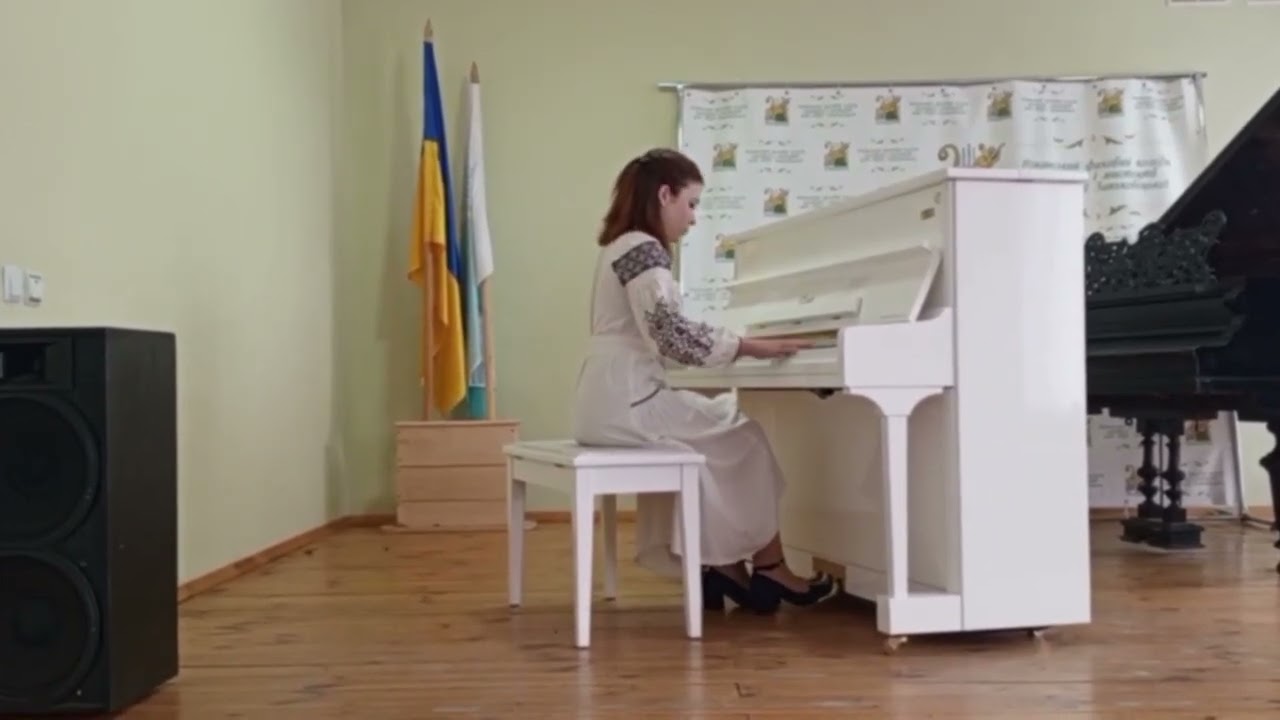 М. Скорик 