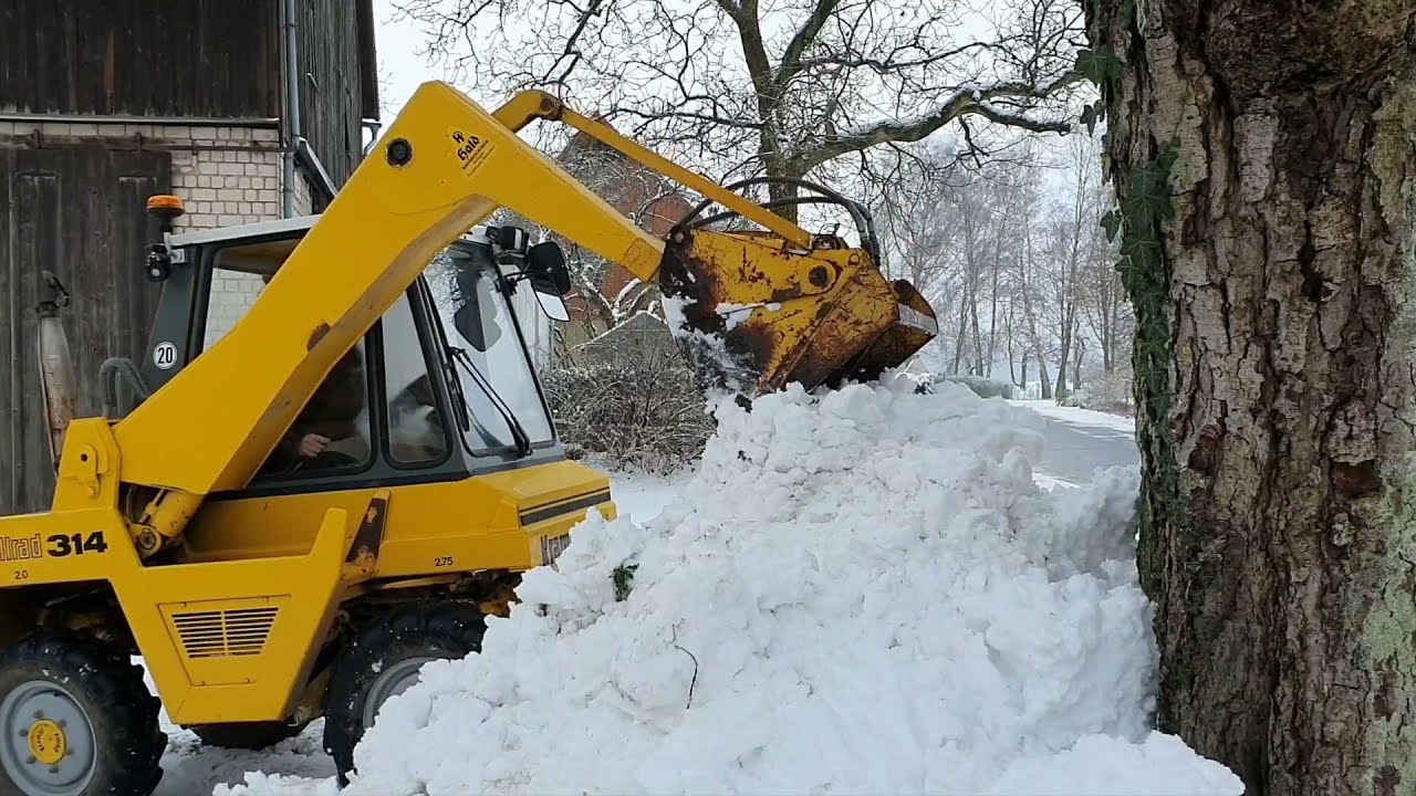 Schnee räumen, Kramer Allrad  Unicat 314, erster Schnee