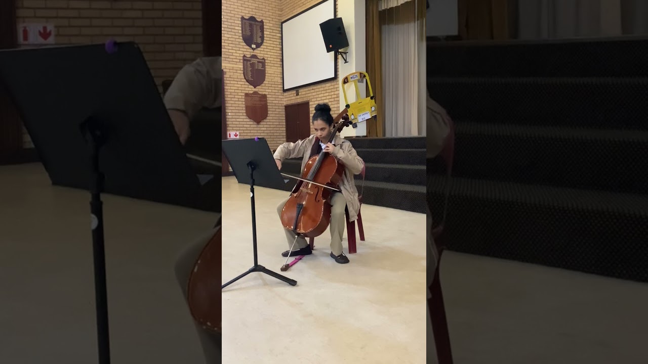 Over the Rainbow played by Kylie and accompanied by Mrs Hart