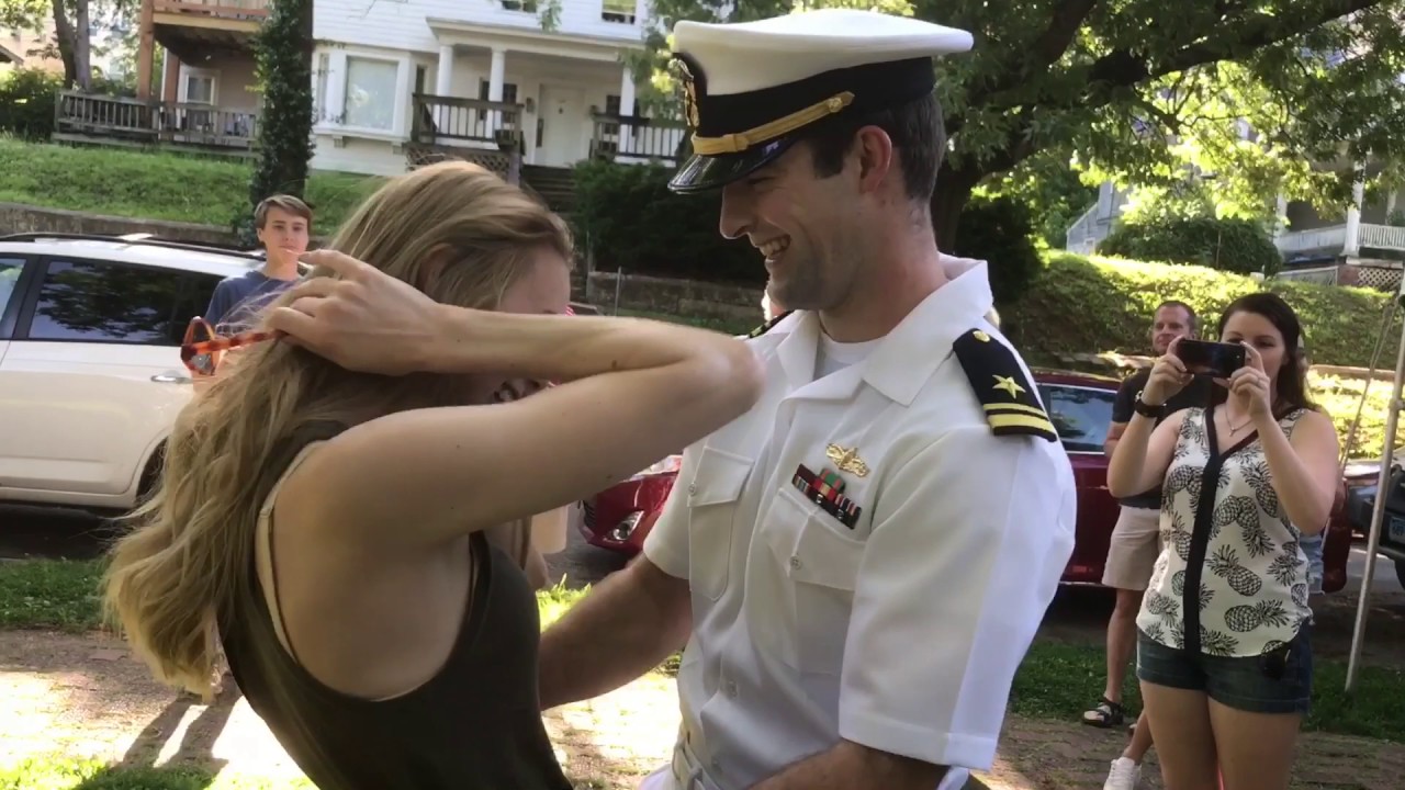 Sailor surprises fiancee at graduation