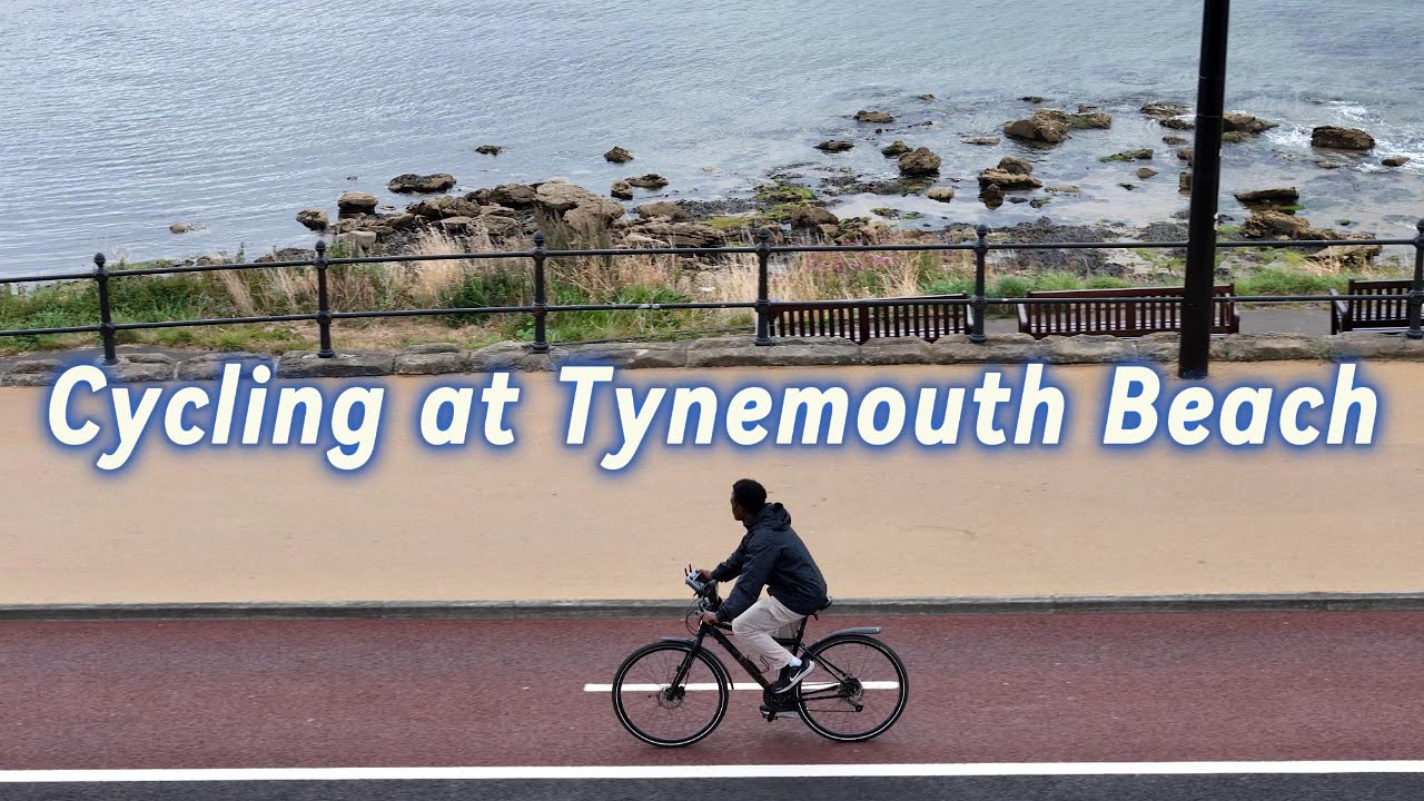 Cycling at Newcastle Tynemouth Beach 4k Drone View