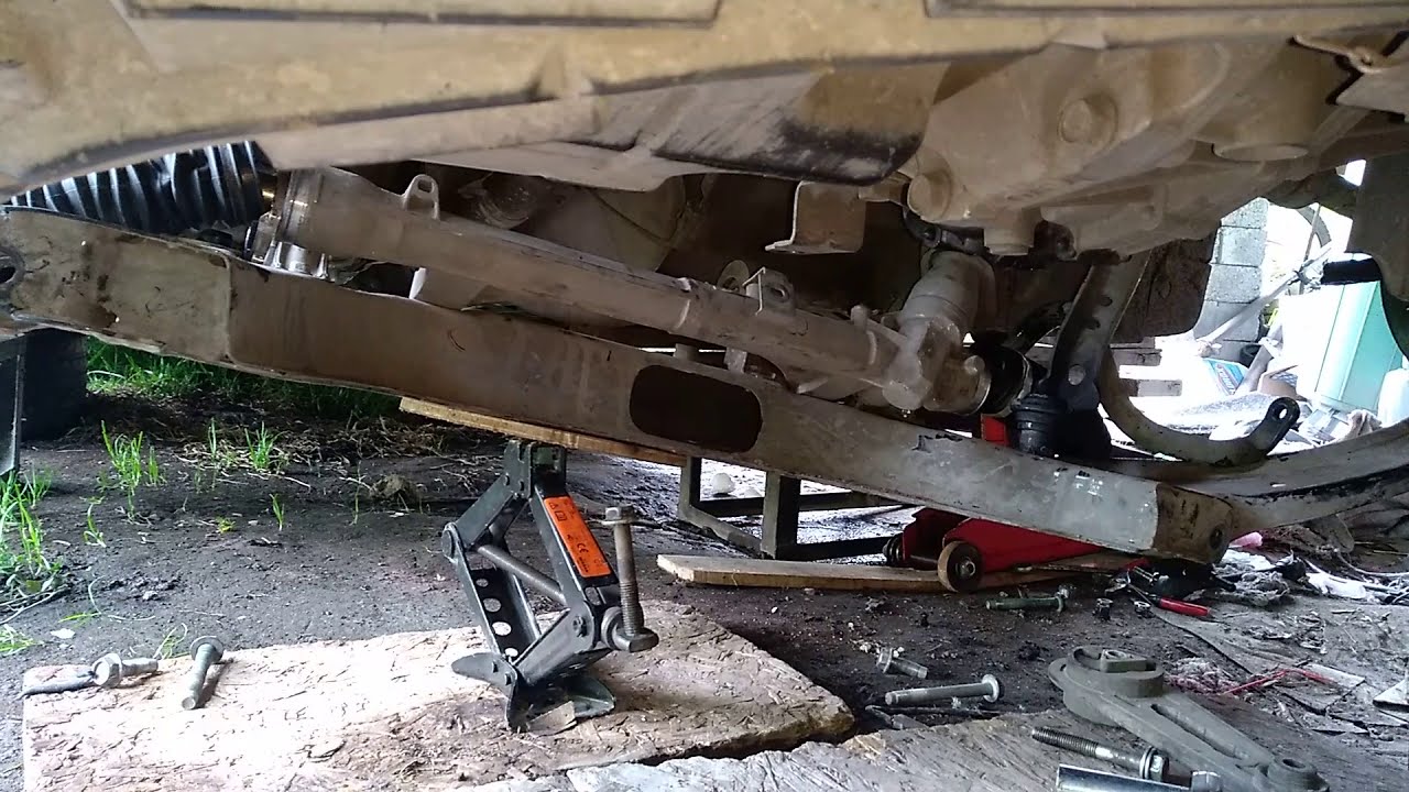 Como cambiar el Puente o cuna de la suspensión delantera del tiida | Parte 2