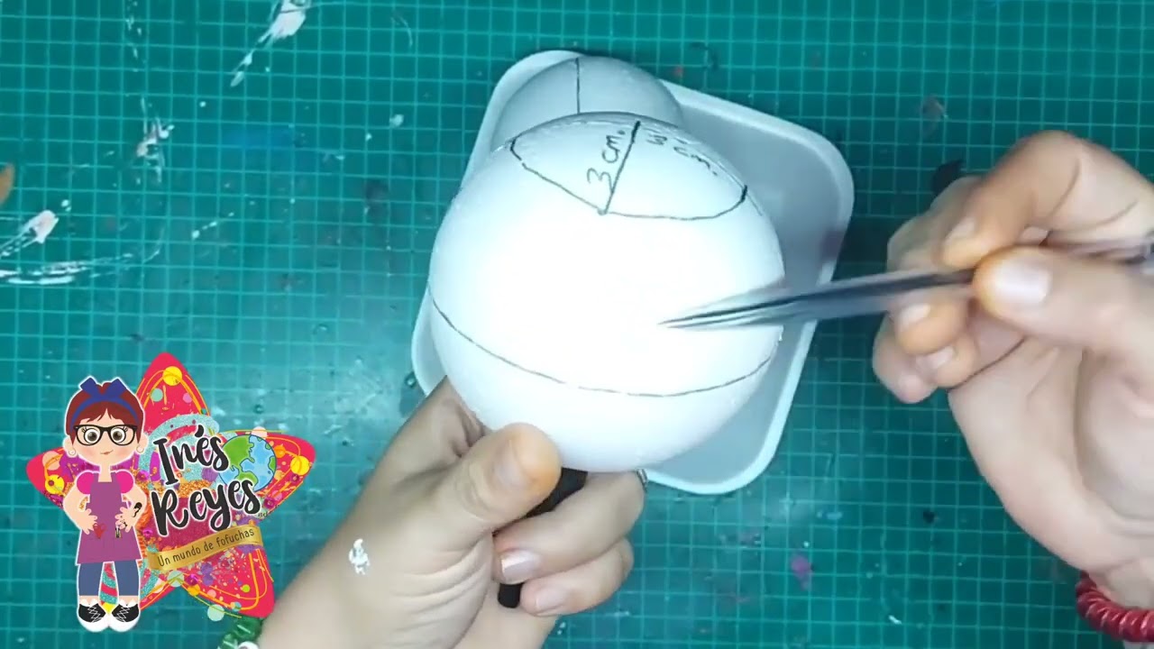 Sacando medidas para tallar caritas de Fofuchos.