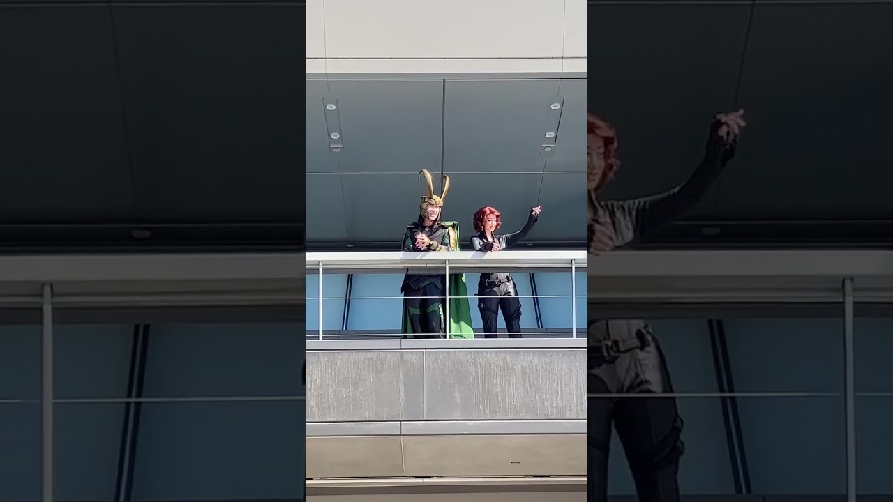 Avengers Campus Loki & Black Widow wave from Avengers HQ balcony-Disney California Adventure 8/13/23