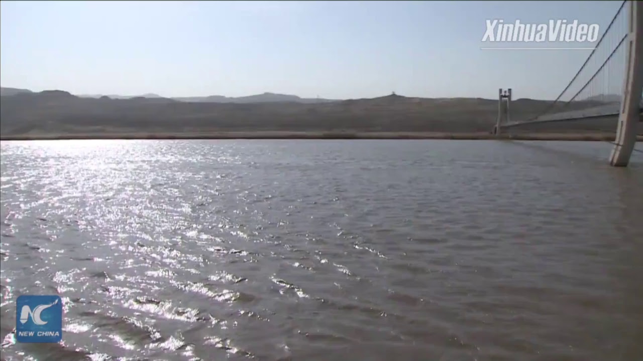 Exploring China's first 3D glass bridge over Yellow River