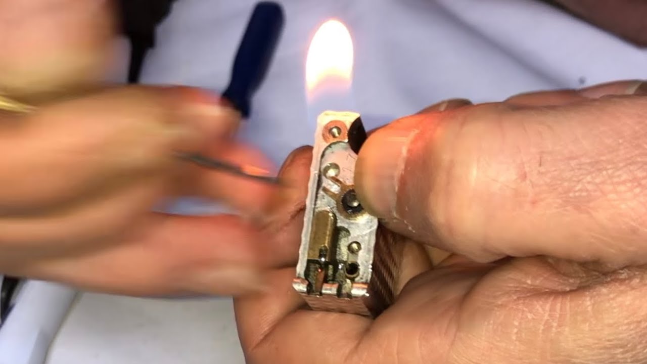 Repairing an old s.t DuPont lighter that had a clogged gas cylinder