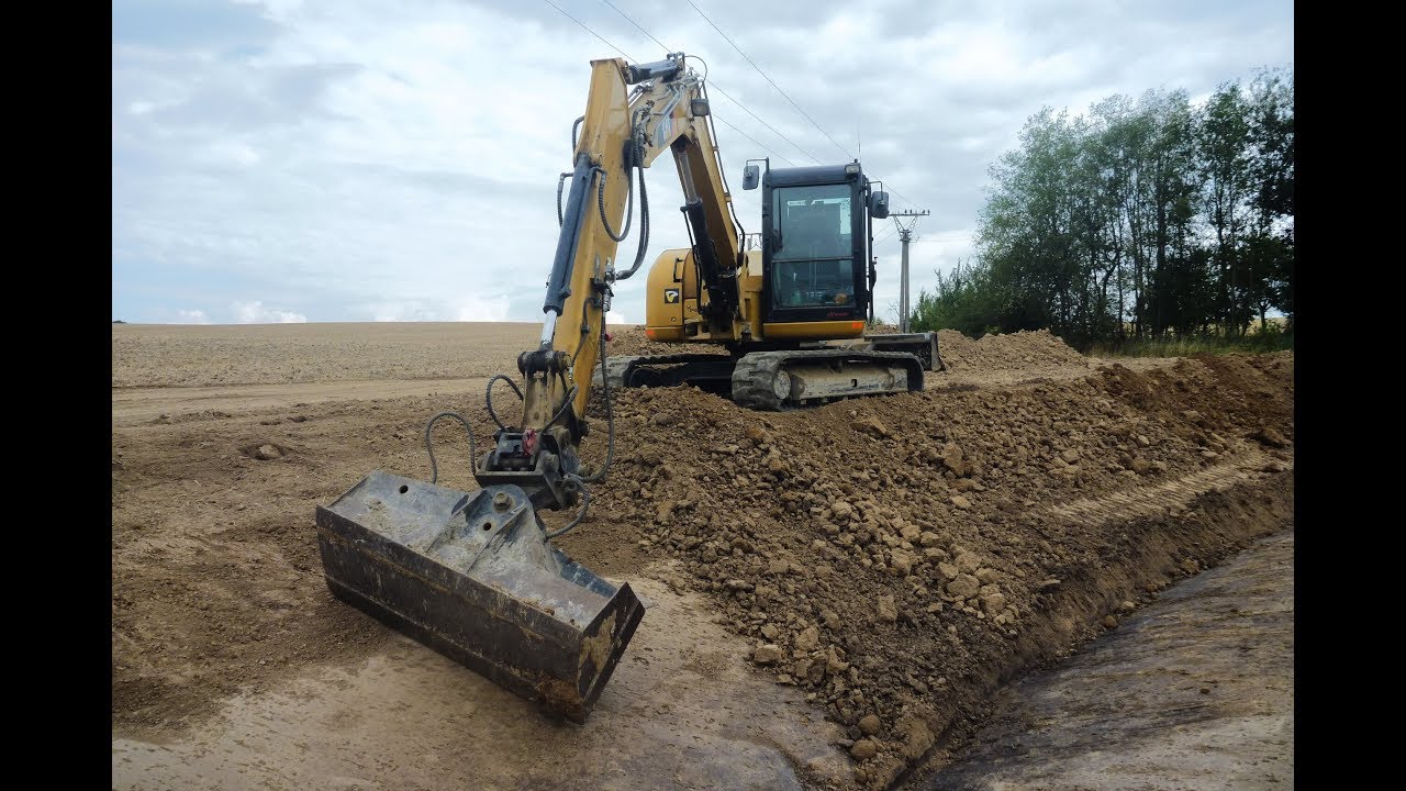 CATERPILLAR 308E creates a ditch