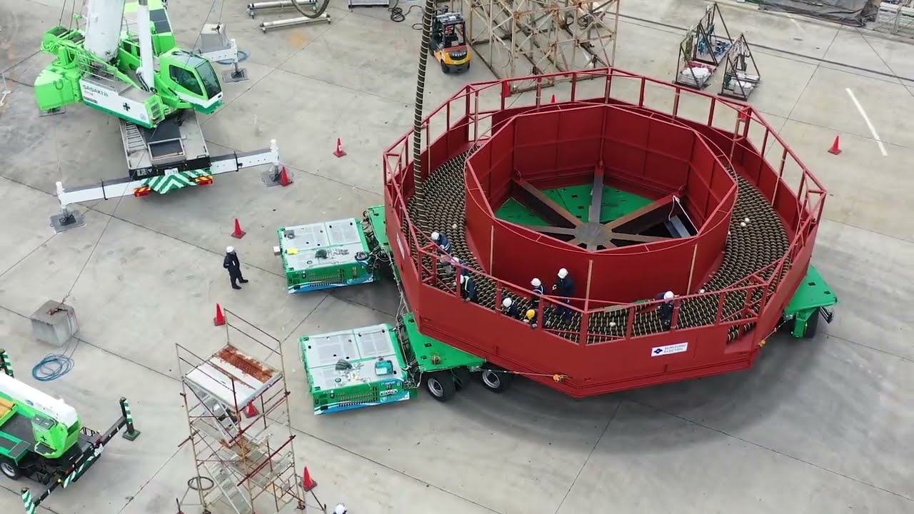 【国内初】SPMT(多軸台車：スーパーキャリア)による海底ケーブルの巻取り作業