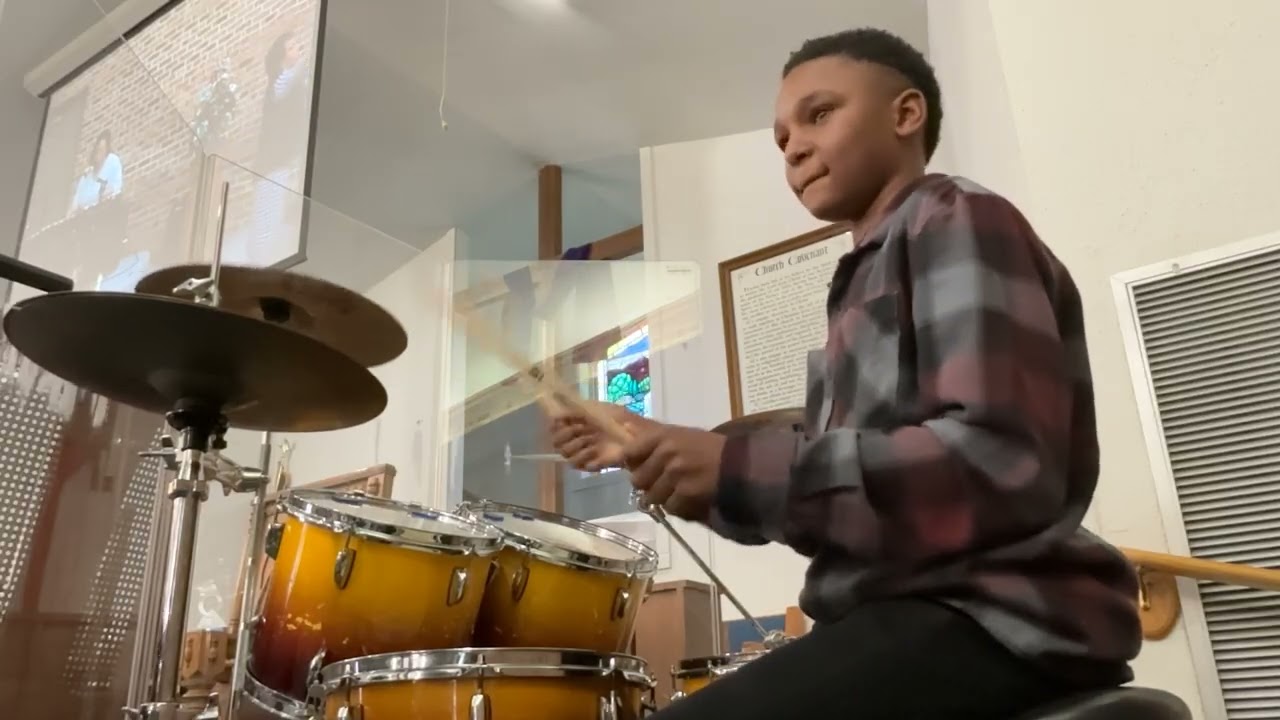 Playing drums at Church