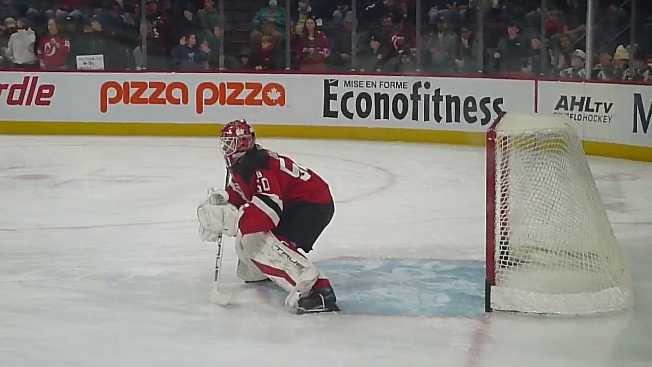 Utica Comets goalie Nico Daws warms up 1/2/26