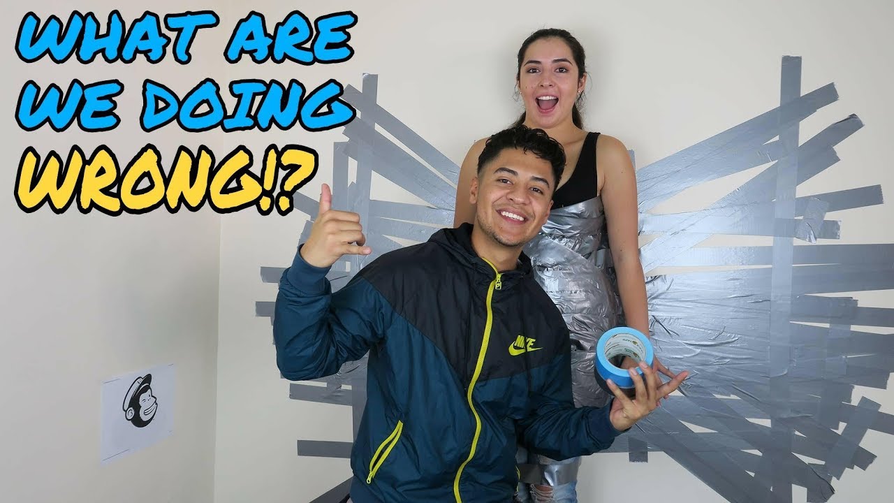 100 LAYERS OF DUCT TAPE CHALLENGE!! *TAPED MY GF TO THE WALL (kinda...)