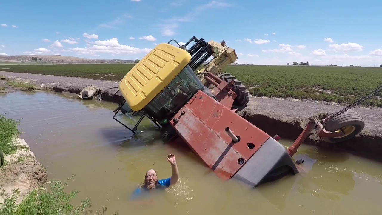 Swather goes for a dip | Water Recovery