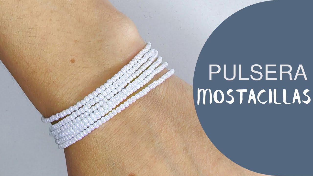 PULSERA DE MOSTACILLAS BLANCAS Y TERMINALES DE TUBO
