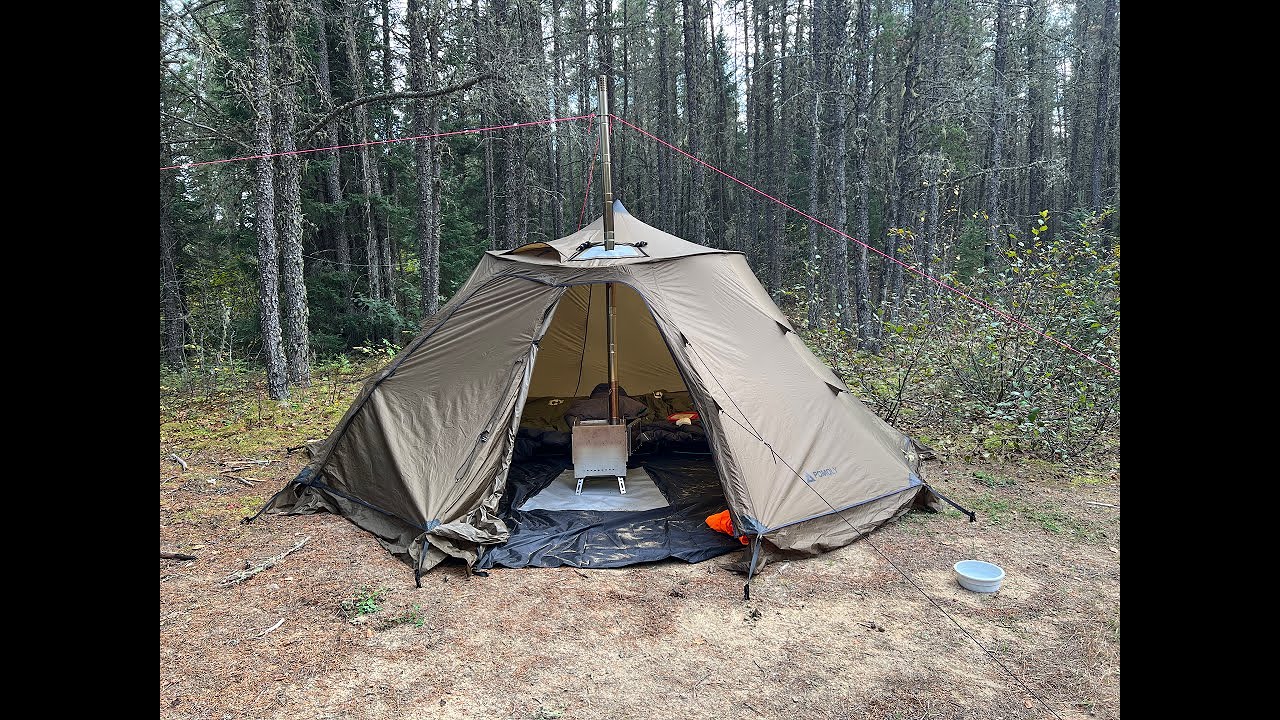 family hot tent camping at emerald lake