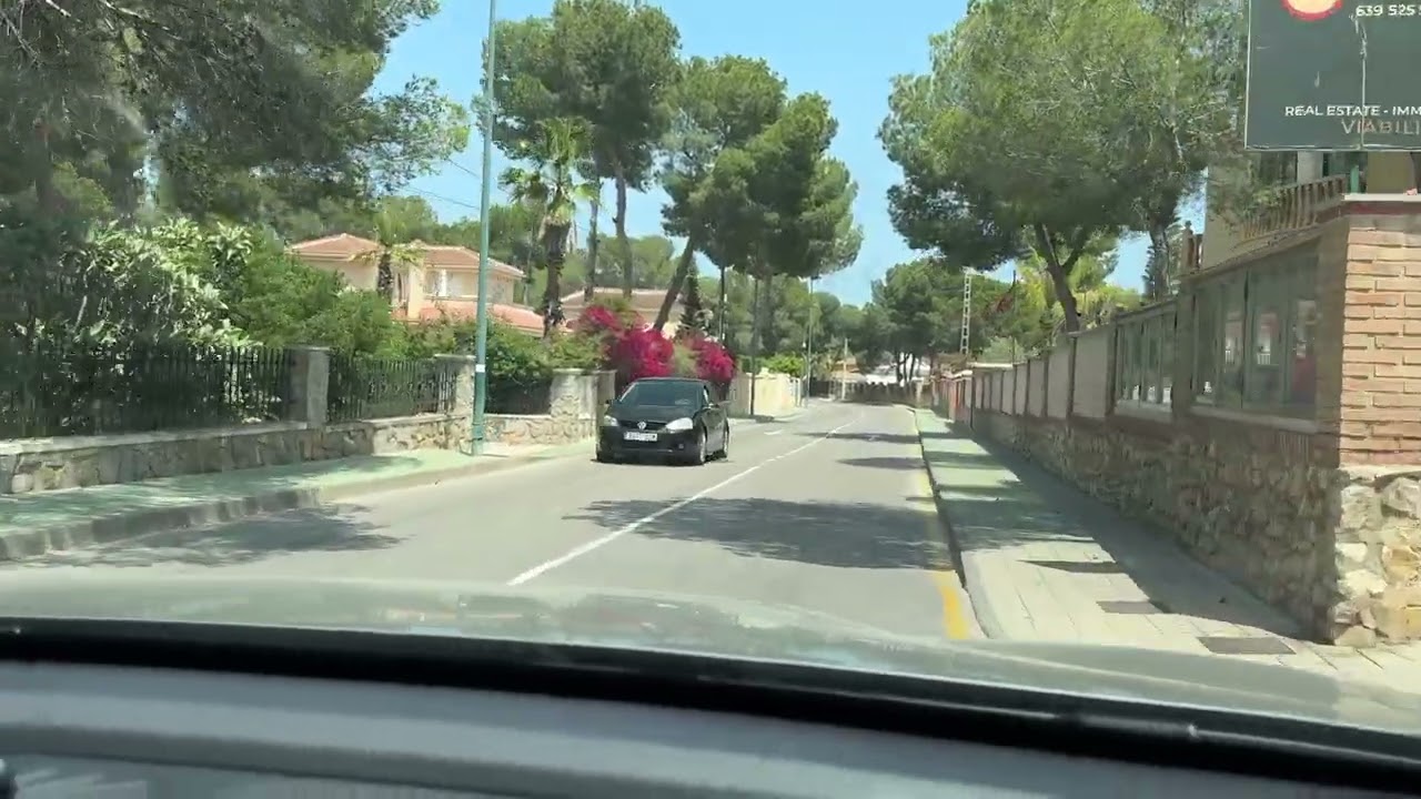 Driving up to Pinar de Campoverde Village. Costa Blanca, Spain
