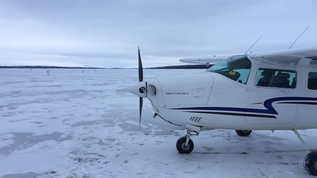 Cessna 210 Off field landing on a frozen lake