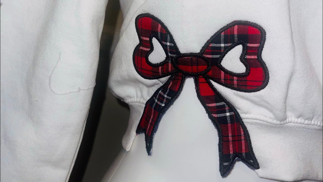 Side bow embroidery Applique on a sweatshirt