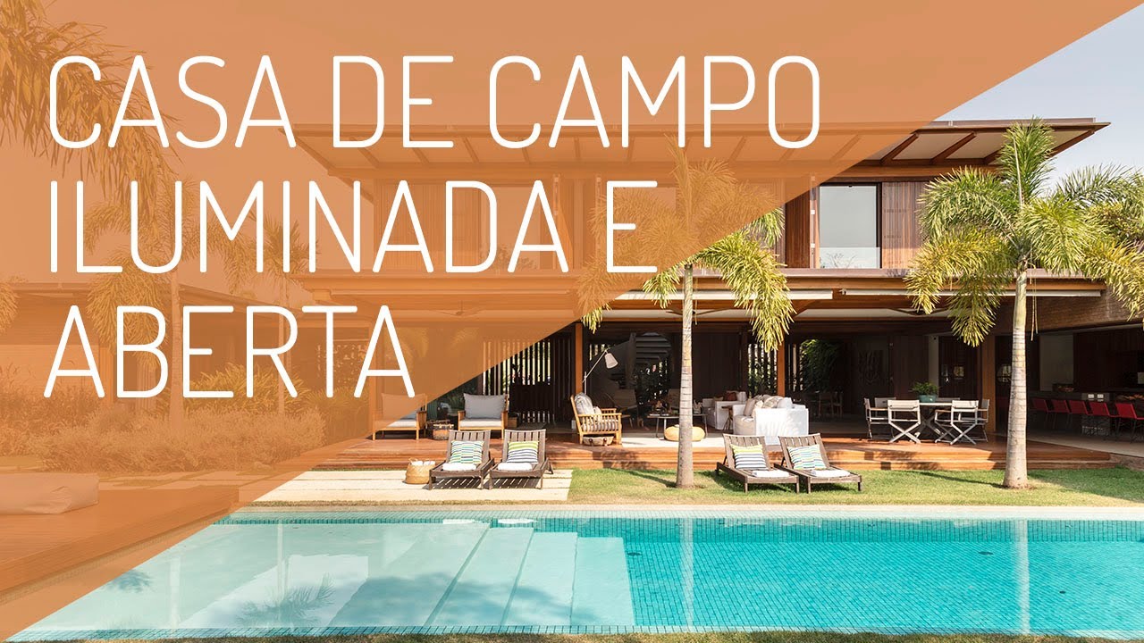 Casa de Campo Integrada com muita Madeira, Vidro, uma Varanda Gourmet e Jardim com Piscina