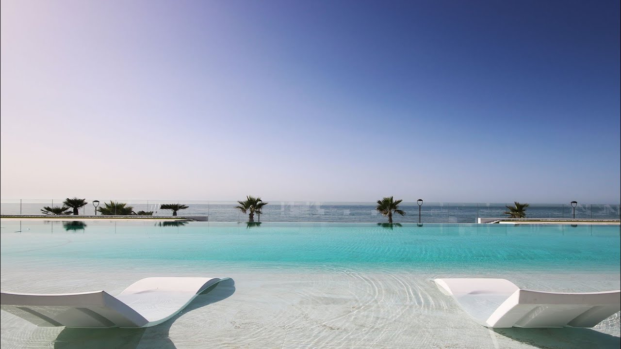 Incredible Beachfront Penthouses located in Estepona, Malaga, Spain | NCH Dallimore Marbella