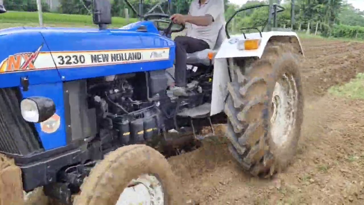New Holland 3230 tractor  with shreehari plough folding plough botad mo. 9824099516,9825825536