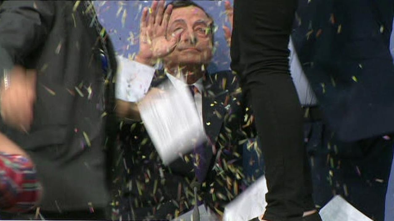 DRAGHI attacked by CONFETTI throwing FEMEN activist at ECB keynote speech