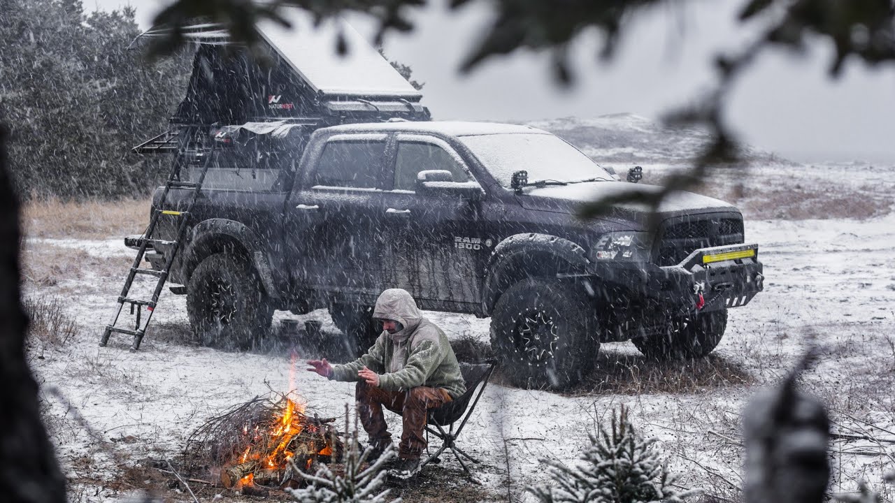 Camping in Snow and Rain with Heated Truck Camper on a Beach