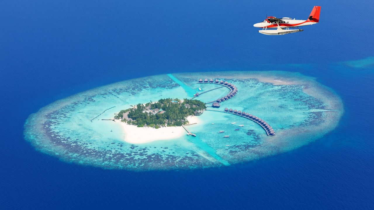 Maldive – Isola di Alimathà: Villaggio Bravo, casette over water, snorkeling e immersioni.