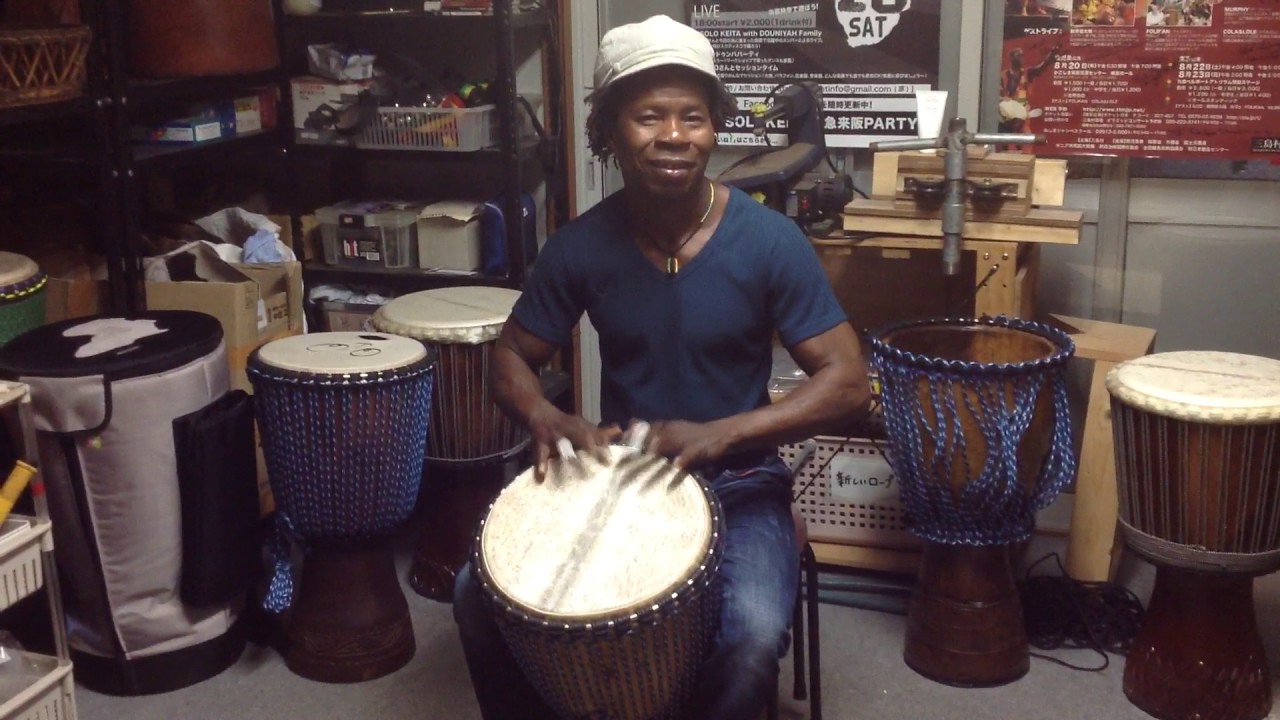 Nansady Keita check sound for djembe ,thick skin