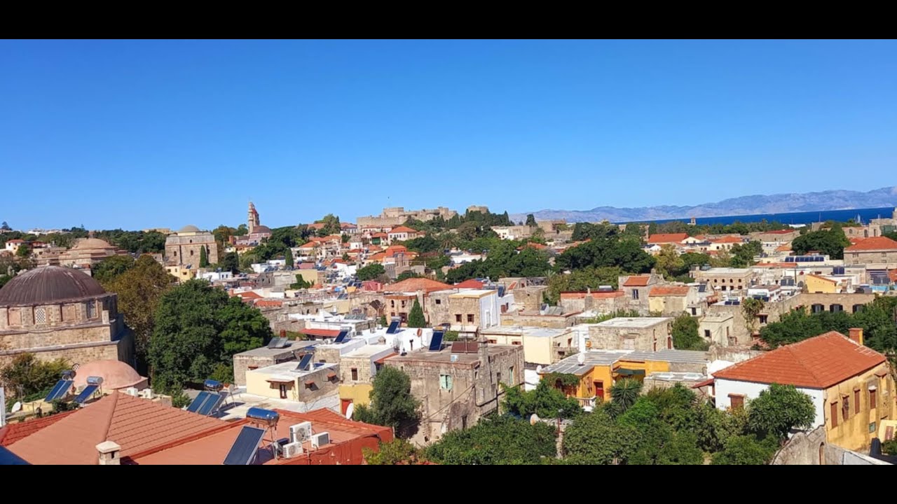 Greek cafe with a lovely view and Rhodes New town Tavernas